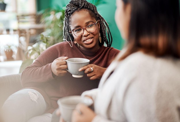 Two women drinking tea