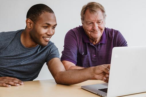 men working on computer