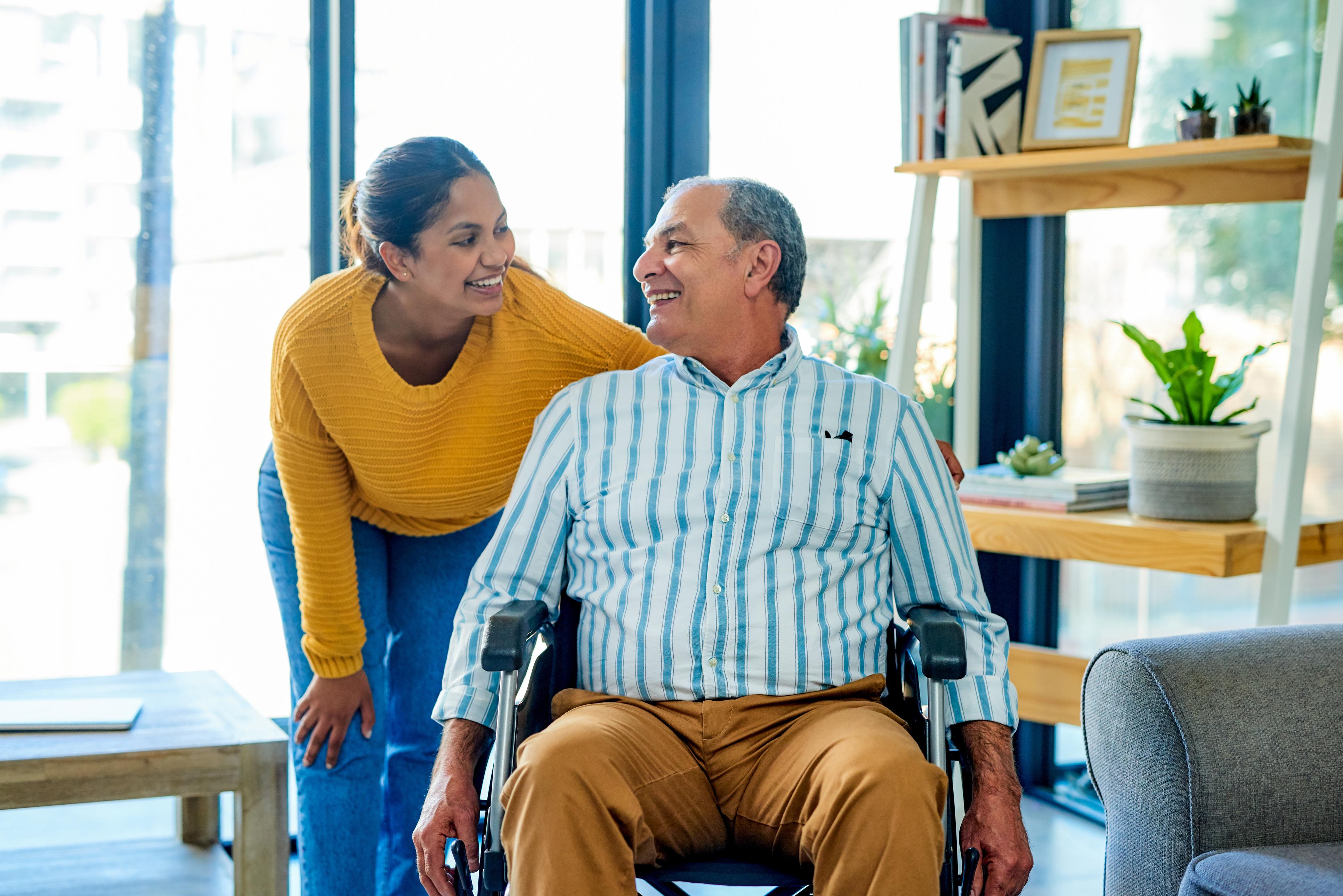 Caregiver with man in wheelchair