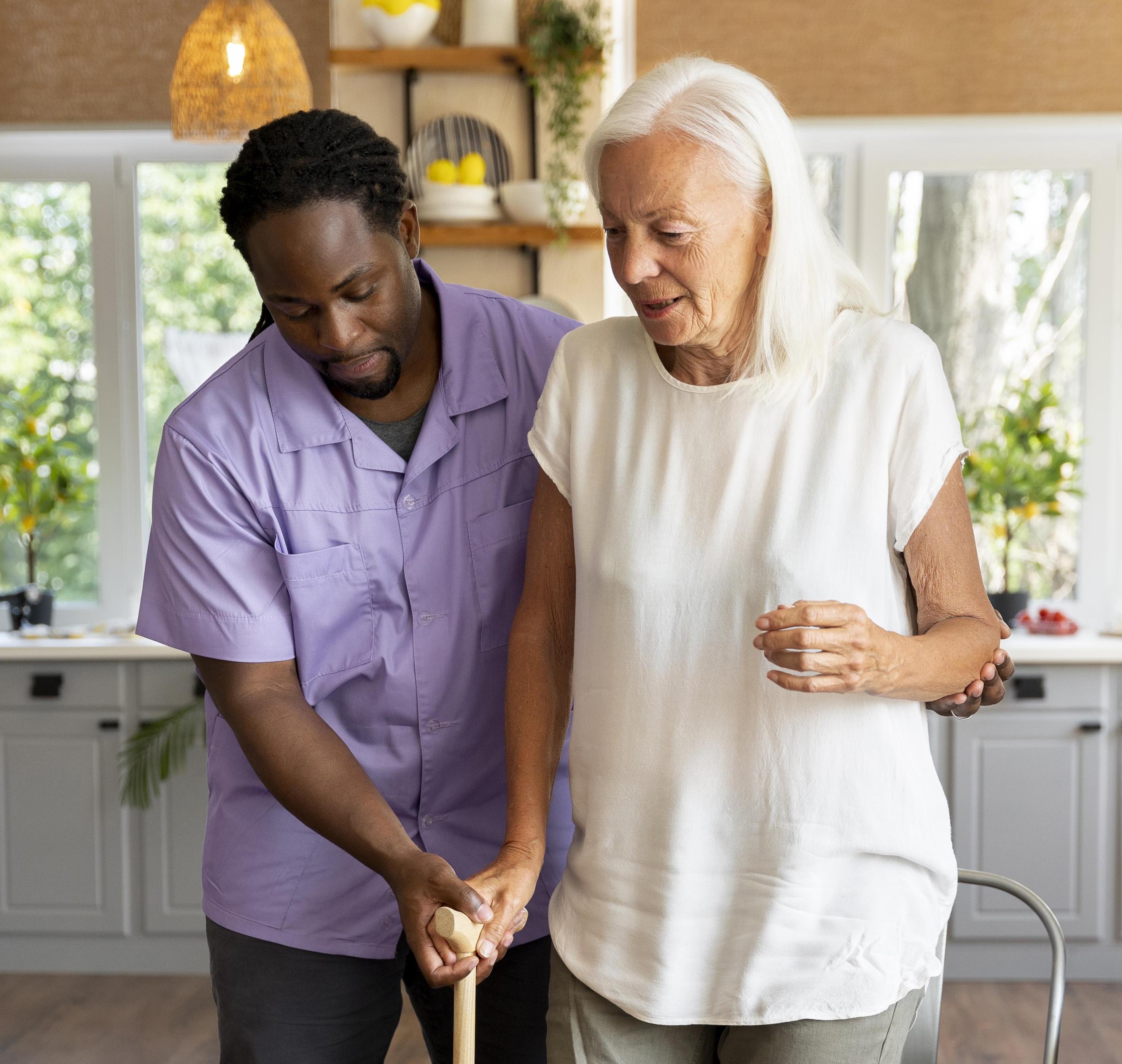 man helping senior woman